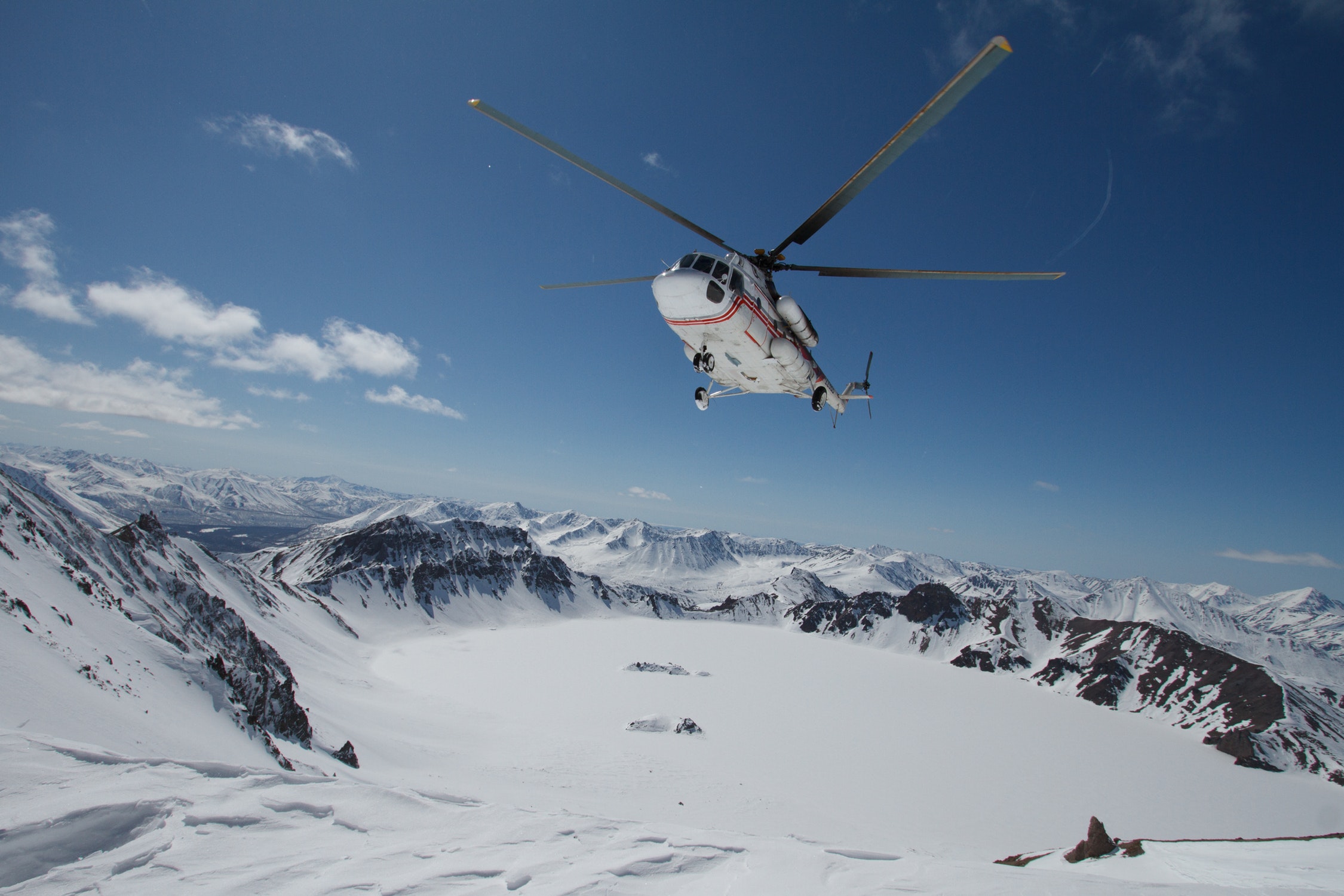 photo of an airplane in the mountains