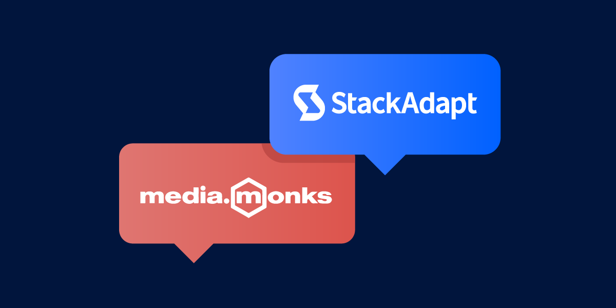 Illustrative graphic of two speech bubbles, one red and one blue, one with media.monks' logo and one with StackAdapt's.