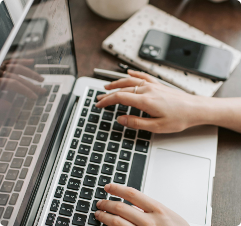 Person typing on a laptop